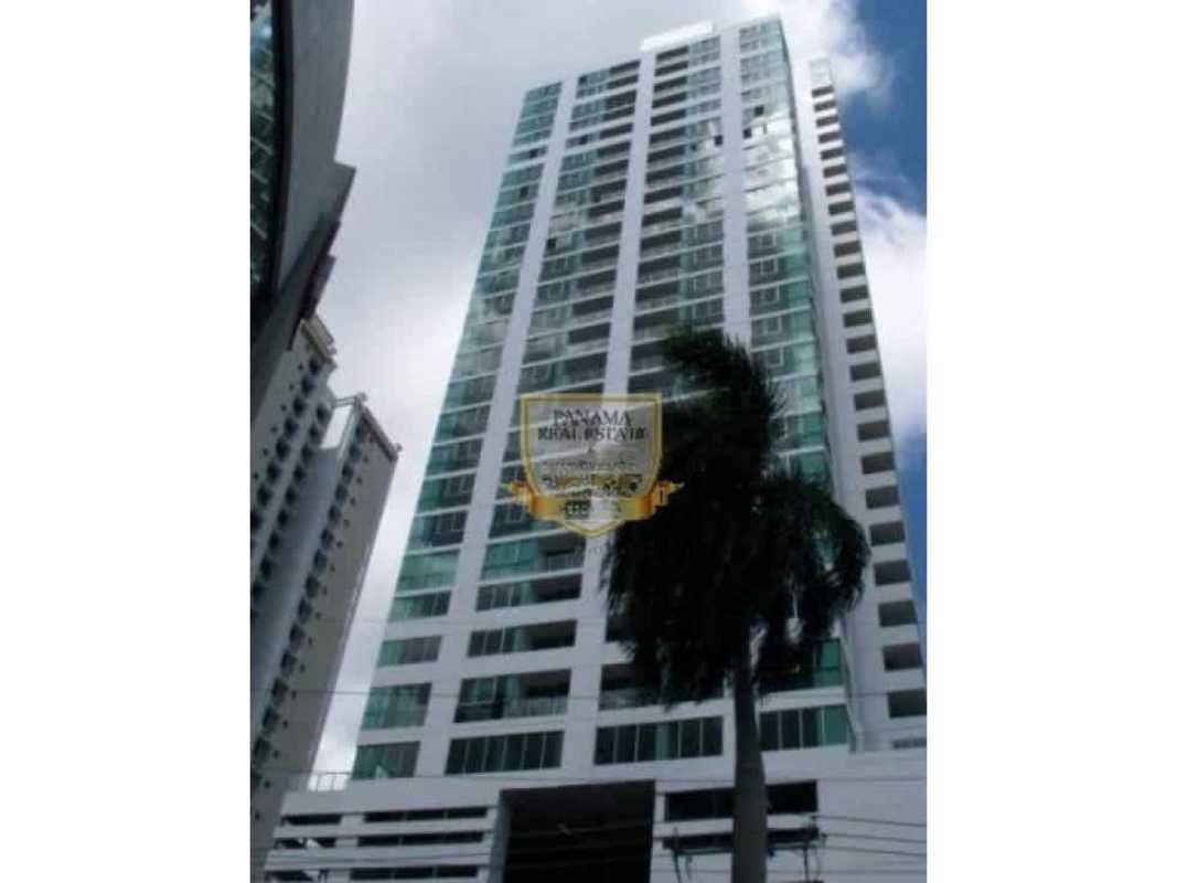 Bright living room with large windows, city and ocean view at PH Waterview Panama City