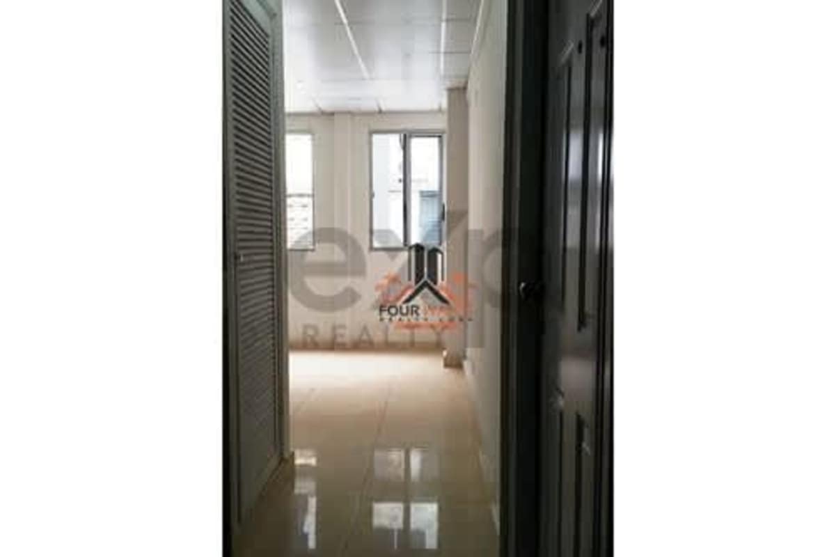 Bright hallway with closet doors and tiled floor Obarrio Tower Panama
