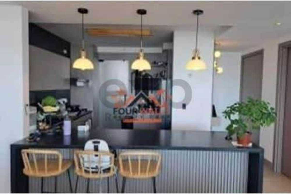 Bright bedroom with floor-to-ceiling windows and stylish finishes in PH Victory Wellness Panama City