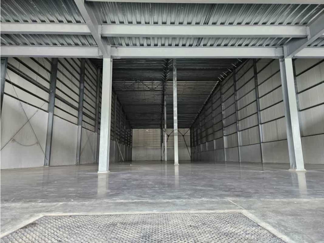 Interior of large industrial warehouse with steel beams and spacious floor in Ancón Panama City