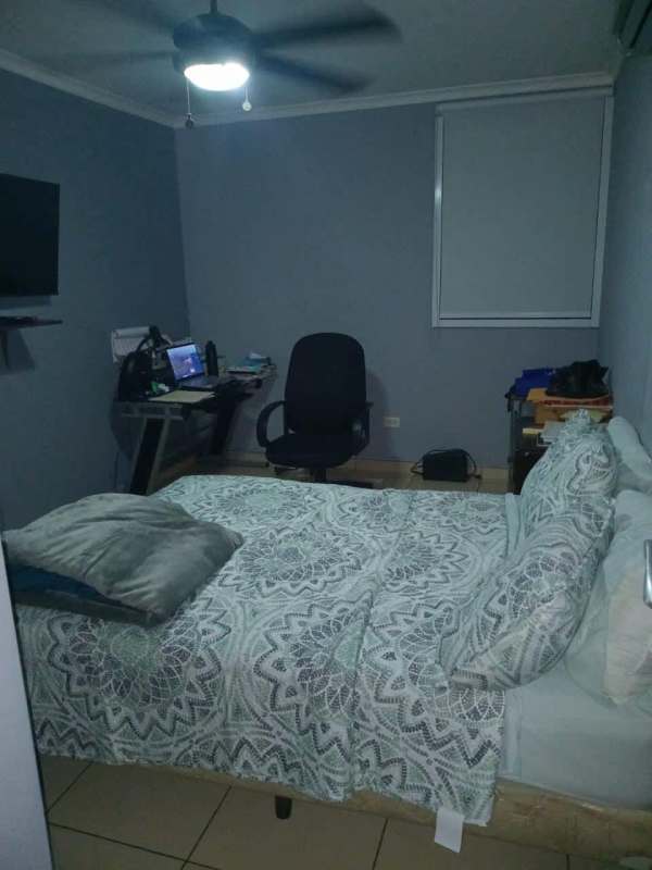 Bedroom with work desk TV ceiling fan PH Dos Mares Tower Panama City