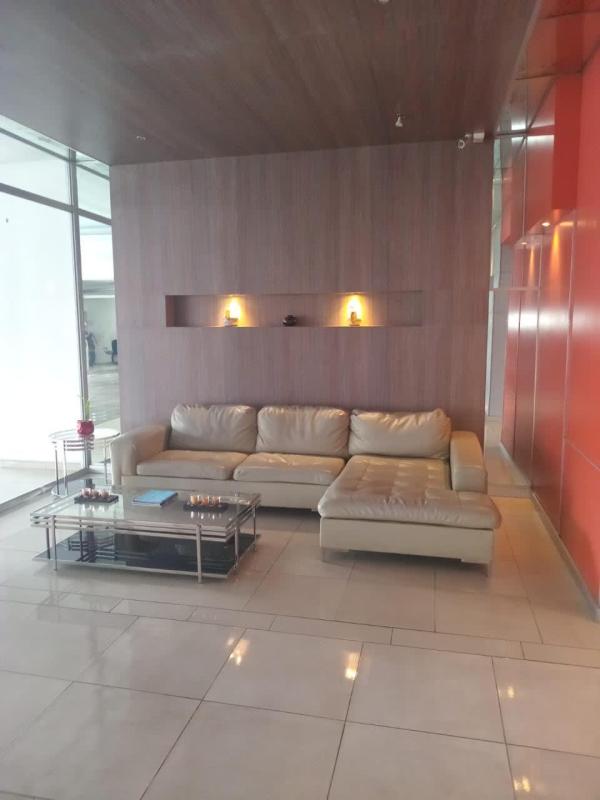Lobby with sectional sofa recessed lighting PH Dos Mares Tower Panama City