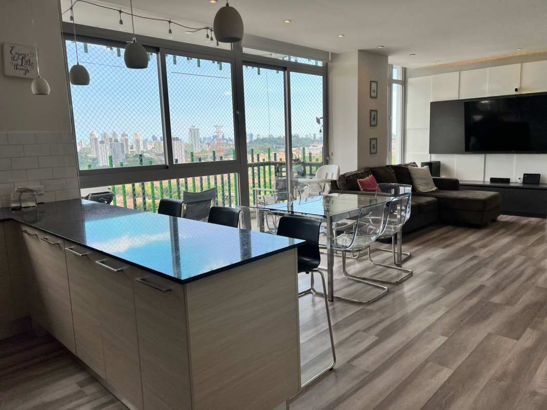 Dining area with open-plan living room and balcony access PH 4 Horizontes Condado del Rey Panama