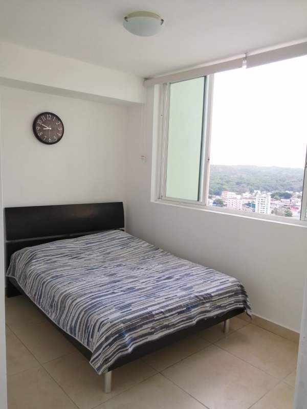 Bedroom with large window city view Edison Park Panama Condo