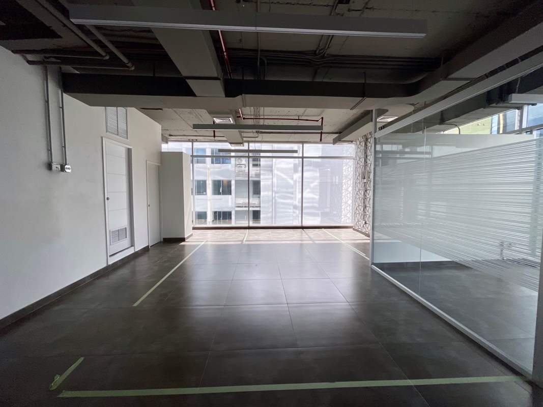 Office area with panoramic city skyline view floor-to-ceiling windows PH BICSA Tower Panama