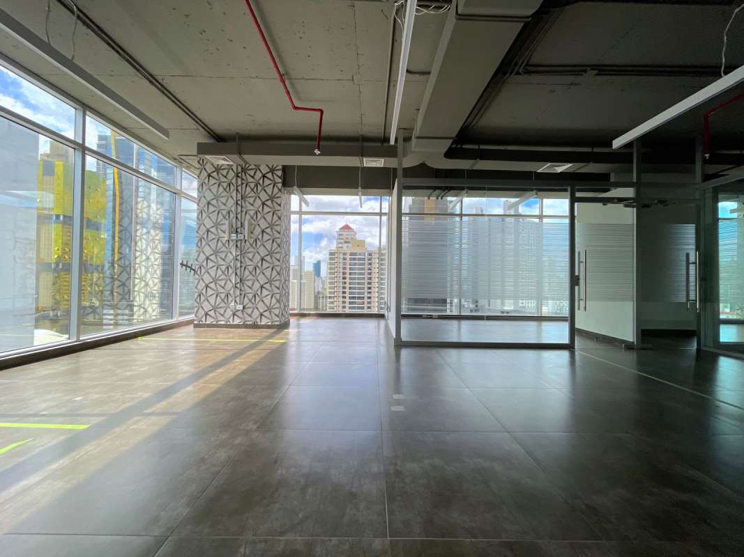 Floor-to-ceiling urban skyline view office space PH BICSA Tower Panama City Panama