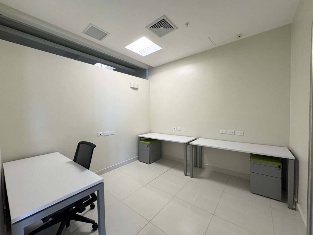 Minimalist private office with multiple workstations Costa del Este Panama
