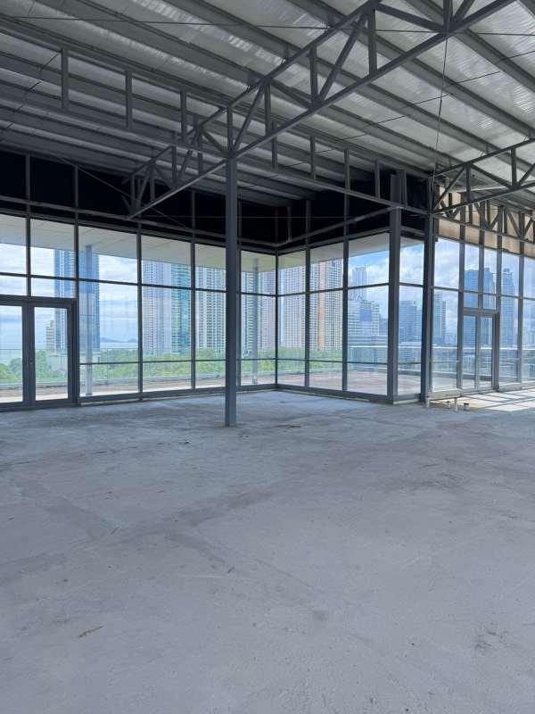 Unfinished large commercial shell with ocean and skyline view in Aquamarina Tower Panama