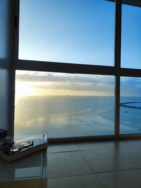 Luxury infinity pool overlooking Pacific Ocean and city skyline at PH H2O Panama
