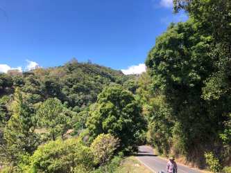 Panoramic mountain view with lush vegetation and winding drive Volcancito Boquete Panama