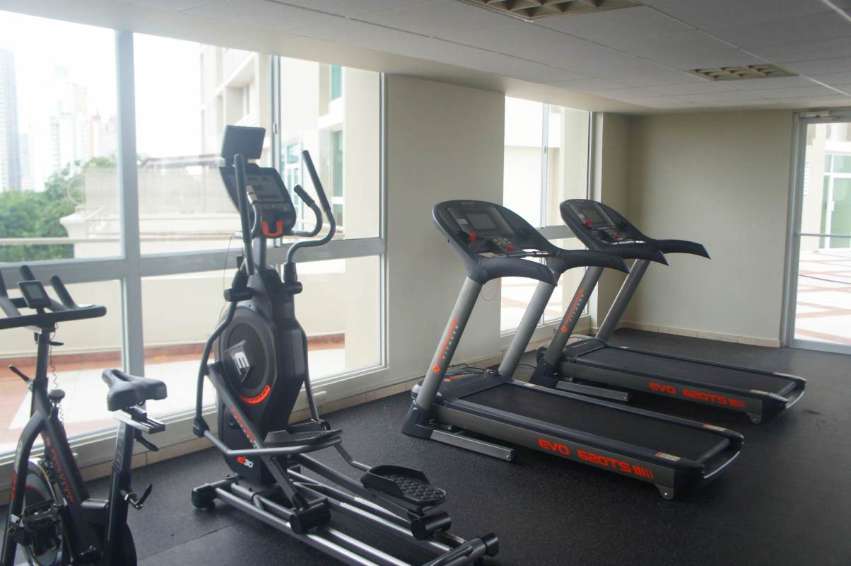 Indoor gym with cardio and fitness equipment at PH El Dorado Park Tower Panama City