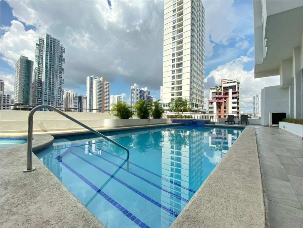 Infinity swimming pool with city skyline background PH Pacific Sea Coco del Mar