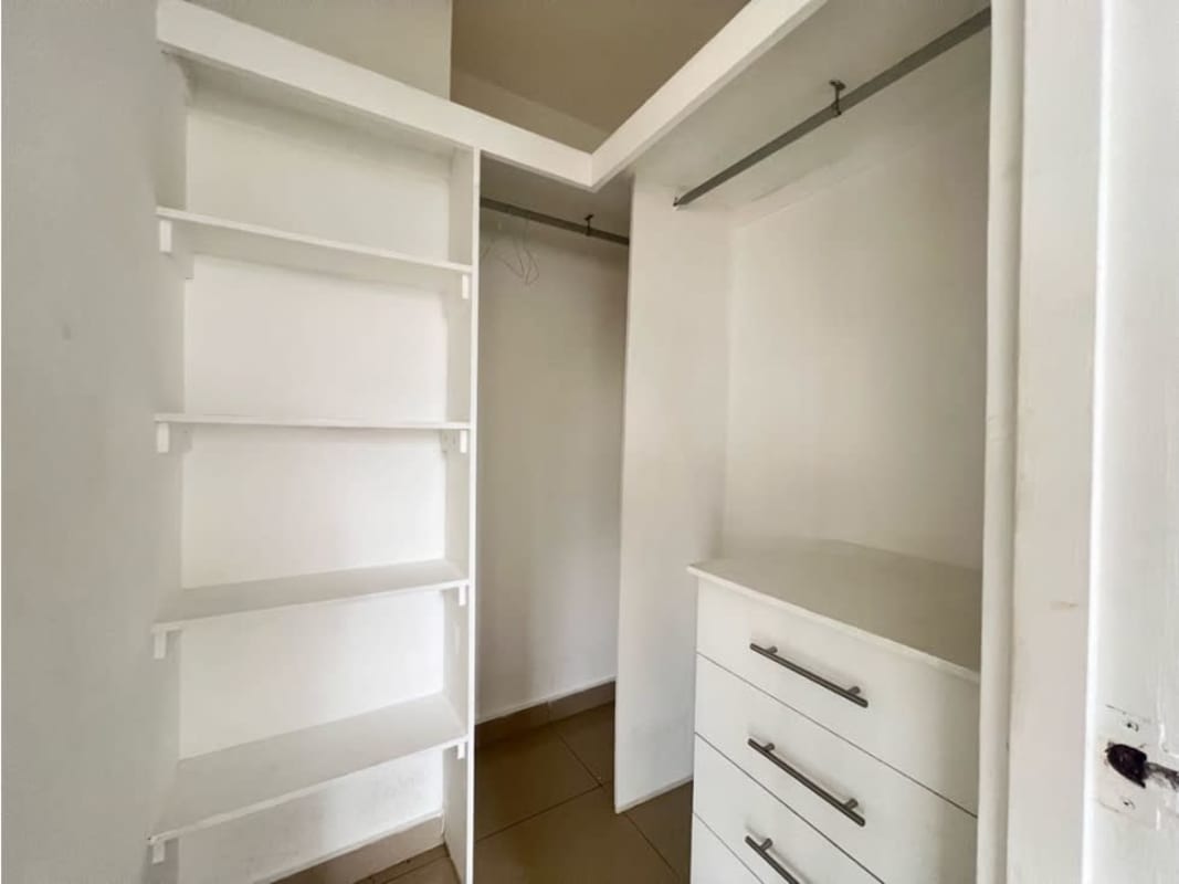 Kitchen with granite counters, wood cabinets, laundry area PH San Francisco Bay