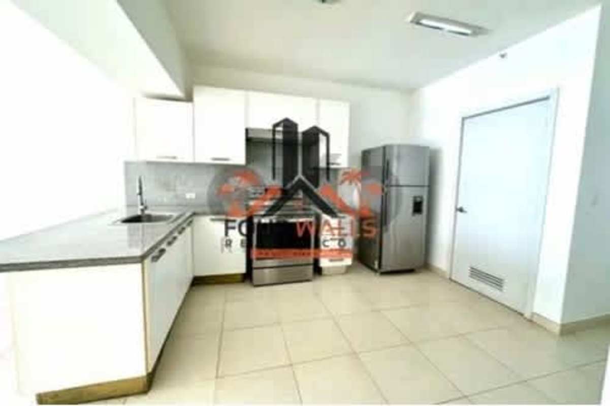 Spacious open living dining room with access to balcony and ocean views PH White Tower