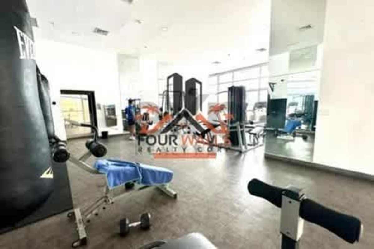 Bright indoor children's playground with murals at PH White Tower Panama City