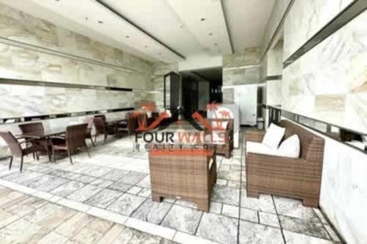 Outdoor terrace with dining and lounge furnishings PH White Tower Panama City Panama