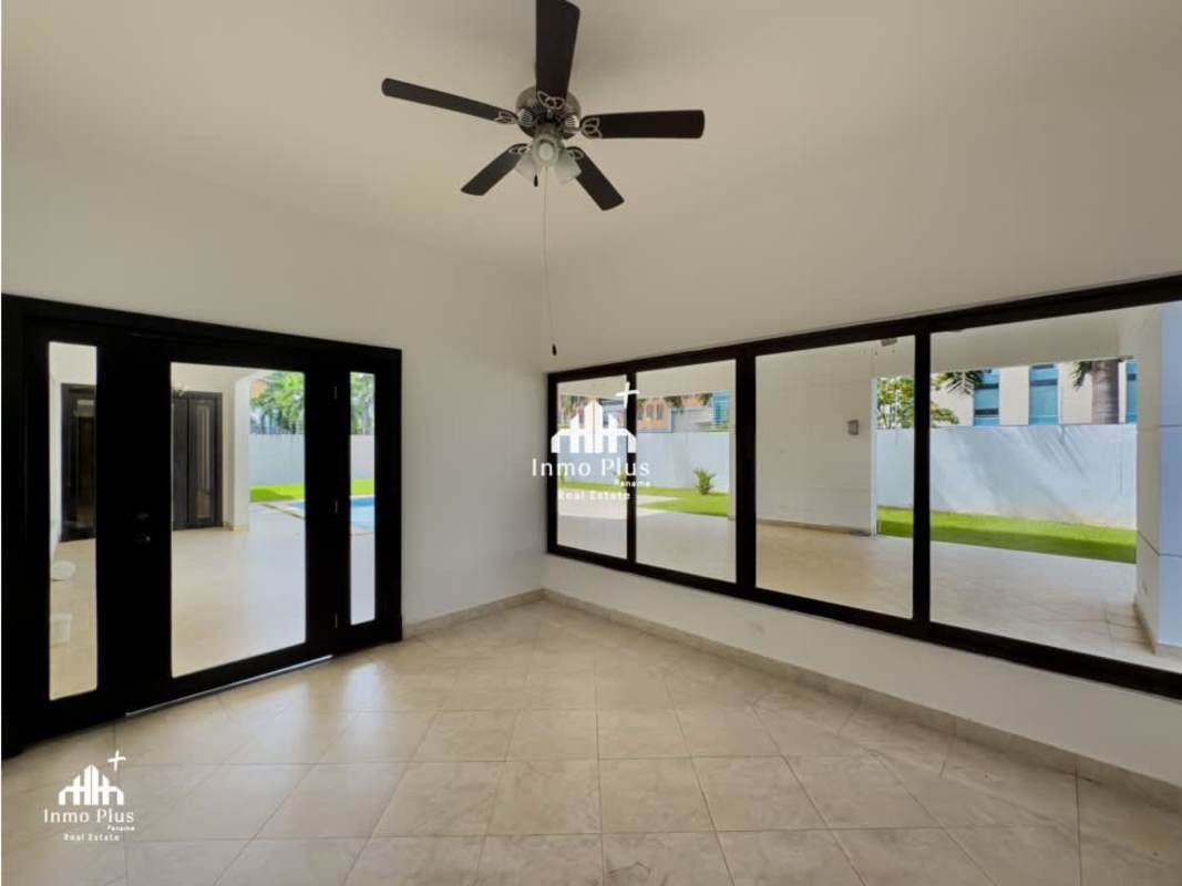 Elegant staircase with marble floors and chandelier in luxury Costa del Este gated community house