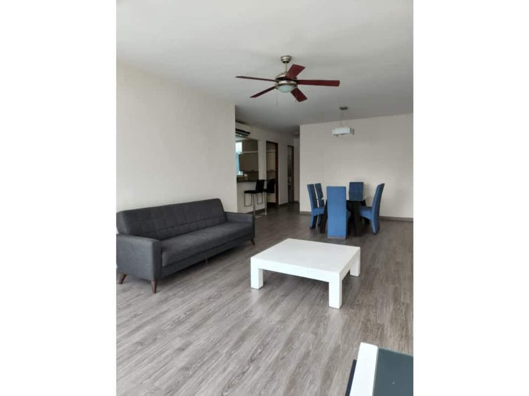 Master bedroom with natural light, ensuite bathroom, and park view near Avenida Balboa Panama