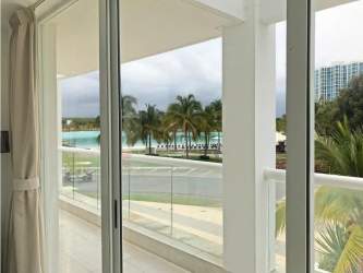 Bedroom with access to balcony lagoon view Town Center Playa Blanca Panama