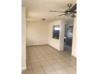 Bedroom with windows and large closet area in Playa Dorada house for sale Panama