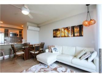 Twin infinity pools with Pacific ocean backdrop at Royal Palm beachfront condominium in Panama