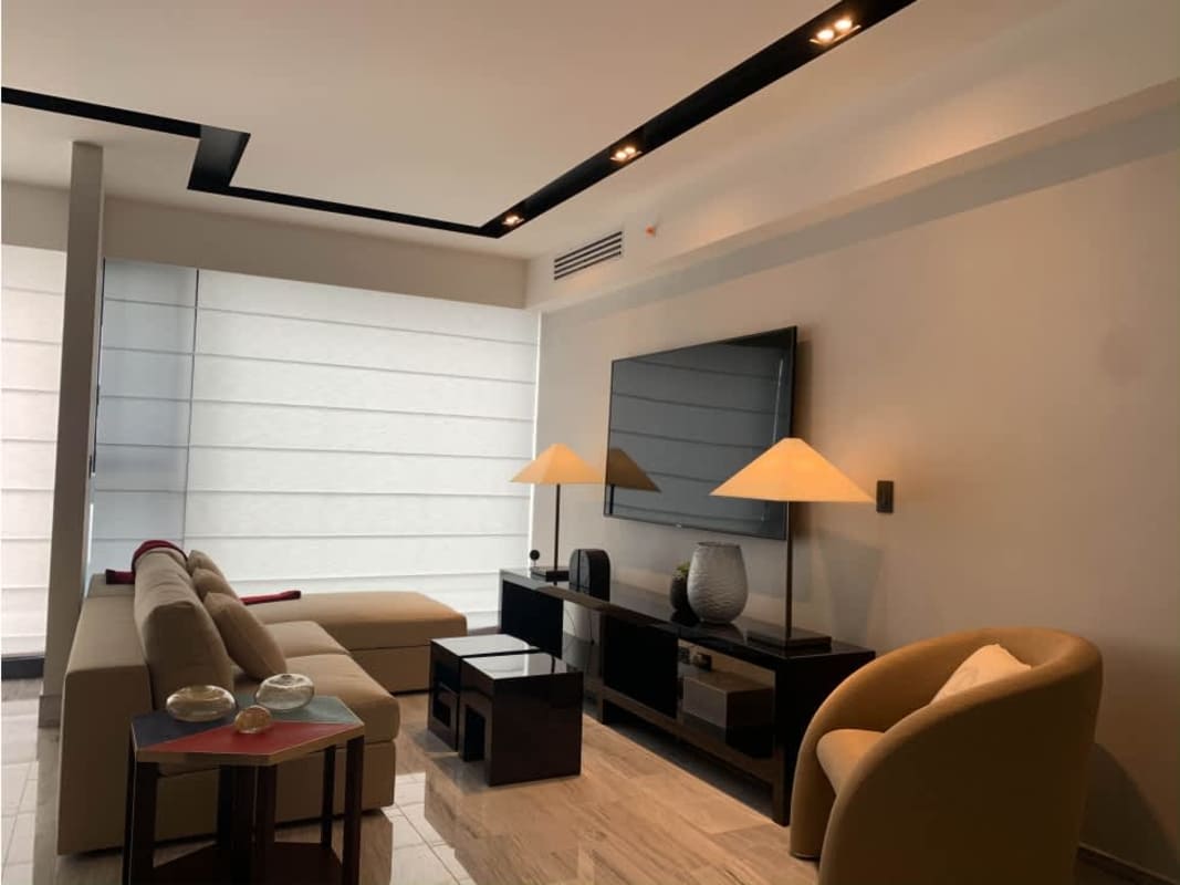 Spacious luxury living area with city views in Nuovo by Armani Casa Panama