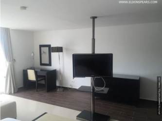 Modern bathroom with vessel sink and designer tiles in Playa Blanca studio apartment