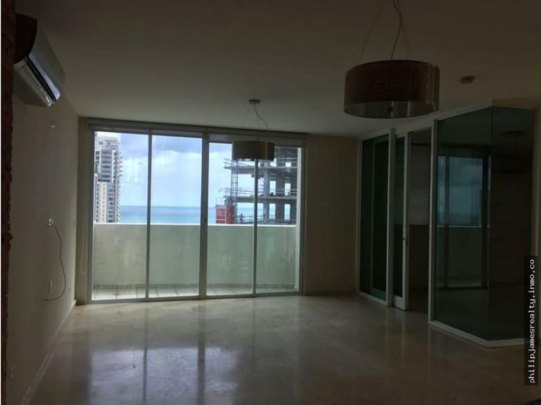 Contemporary penthouse kitchen with granite countertops and ample storage PH Costa Pacifica Panama