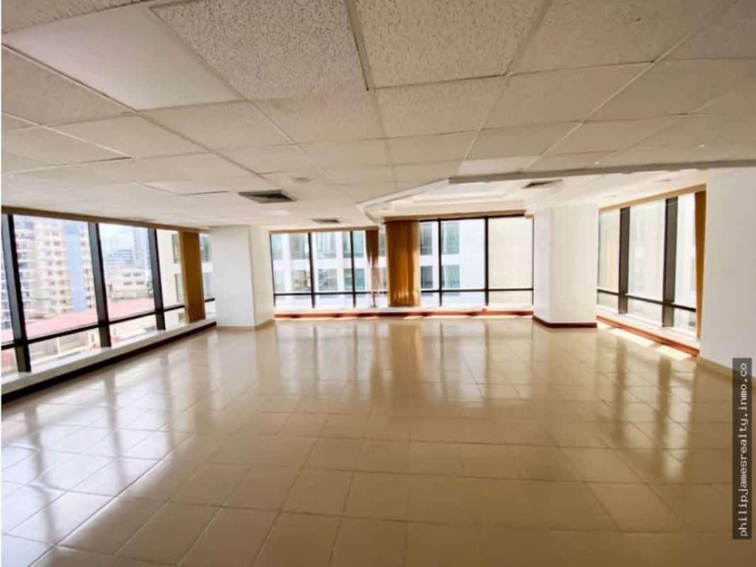 Corner commercial office space with large windows overlooking financial district in PH Vallarino Tower