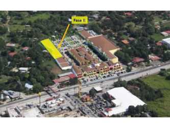 Aerial shot of shopping center with expansion area The Village Coronado Panama
