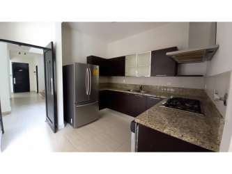 Spacious master bedroom with balcony access and bathroom house rental Nativa Panama