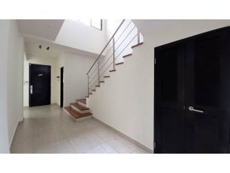 Spacious modern living room with large windows and terrace access house for rent in Nativa Panama