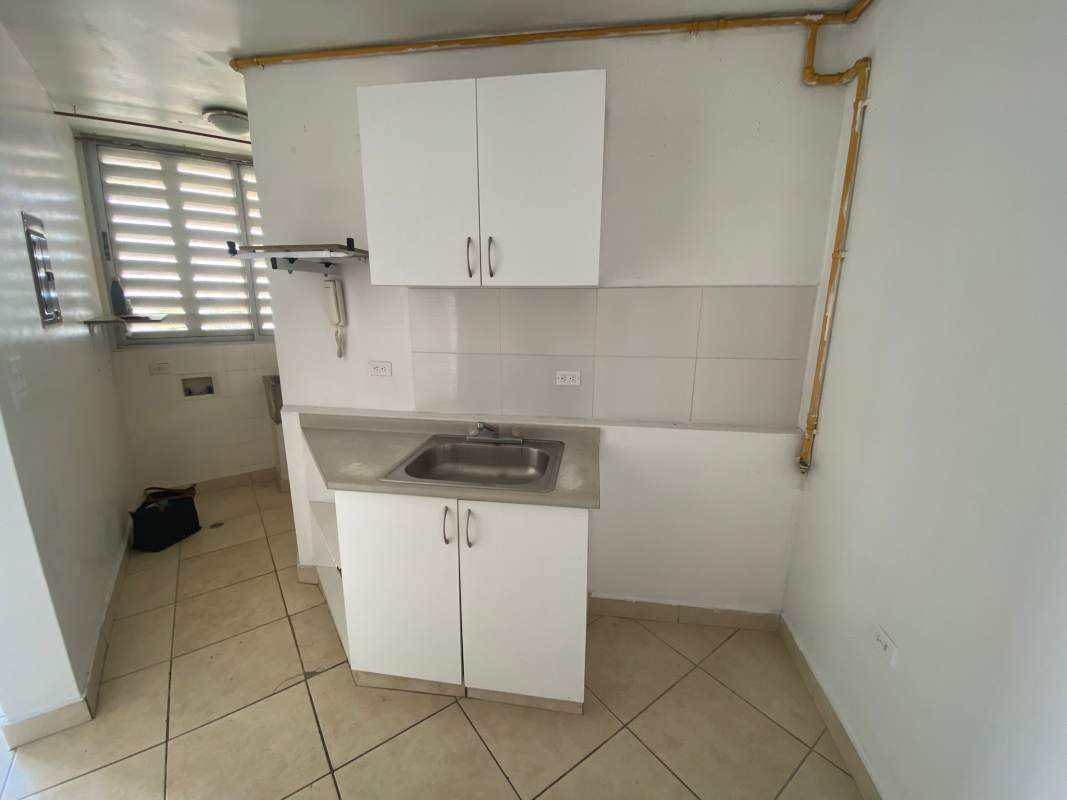 Bright office space or potential reception area with large windows and city views in PH Colores de Bella Vista Panama City