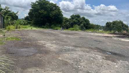 Asphalted large open area suitable for maneuvering trucks and outdoor storage industrial warehouse La Chorrera Panama