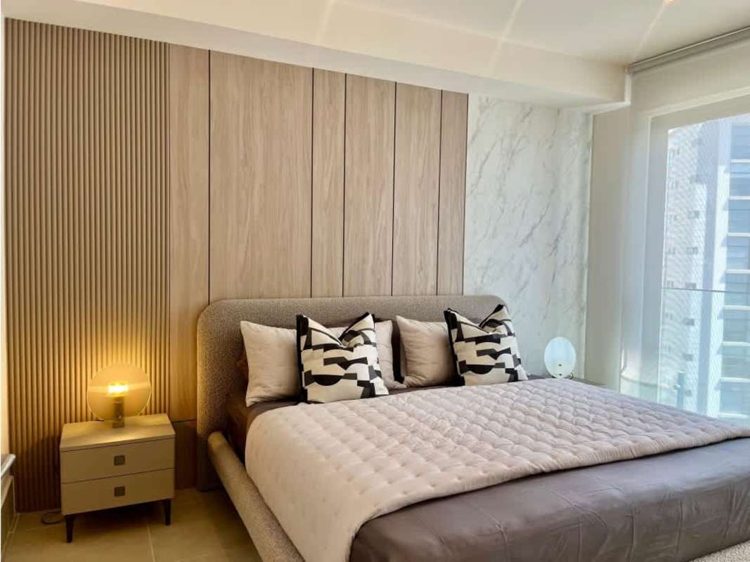 Elegant bedroom with city views and natural light at PH Ocean House Santa Maria Panama