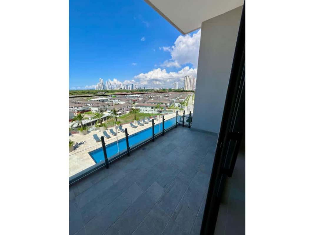 Contemporary kitchen with quartz counters and built-in stainless appliances PH Ocean House Santa María Panama