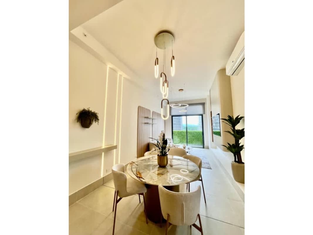 Second bedroom with floor-to-ceiling windows, built-in closet, golf view in PH Ocean House Panama