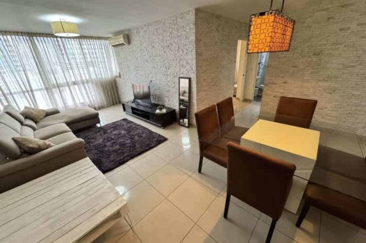 Dining space with glass table modern lighting city apartment PH San Francisco Bay Panama