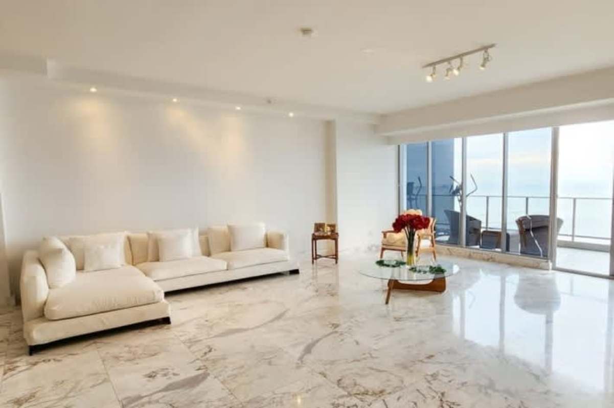 Sleek luxury kitchen with island, stainless appliances, bright window Costa del Este PH Regalia Panama