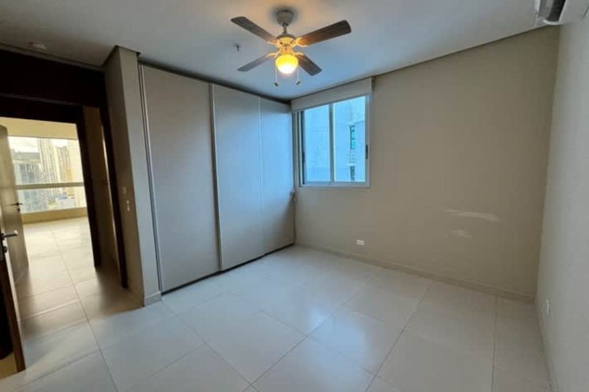 Balcony with panoramic city skyline view in PH Marbella Tower Panama City apartment