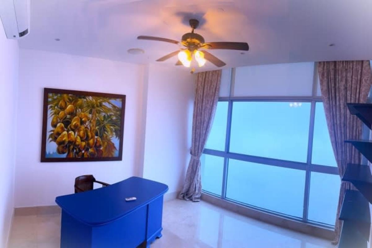 Luxury kitchen with granite countertops, stainless appliances, island in Costa del Este apartment Panama