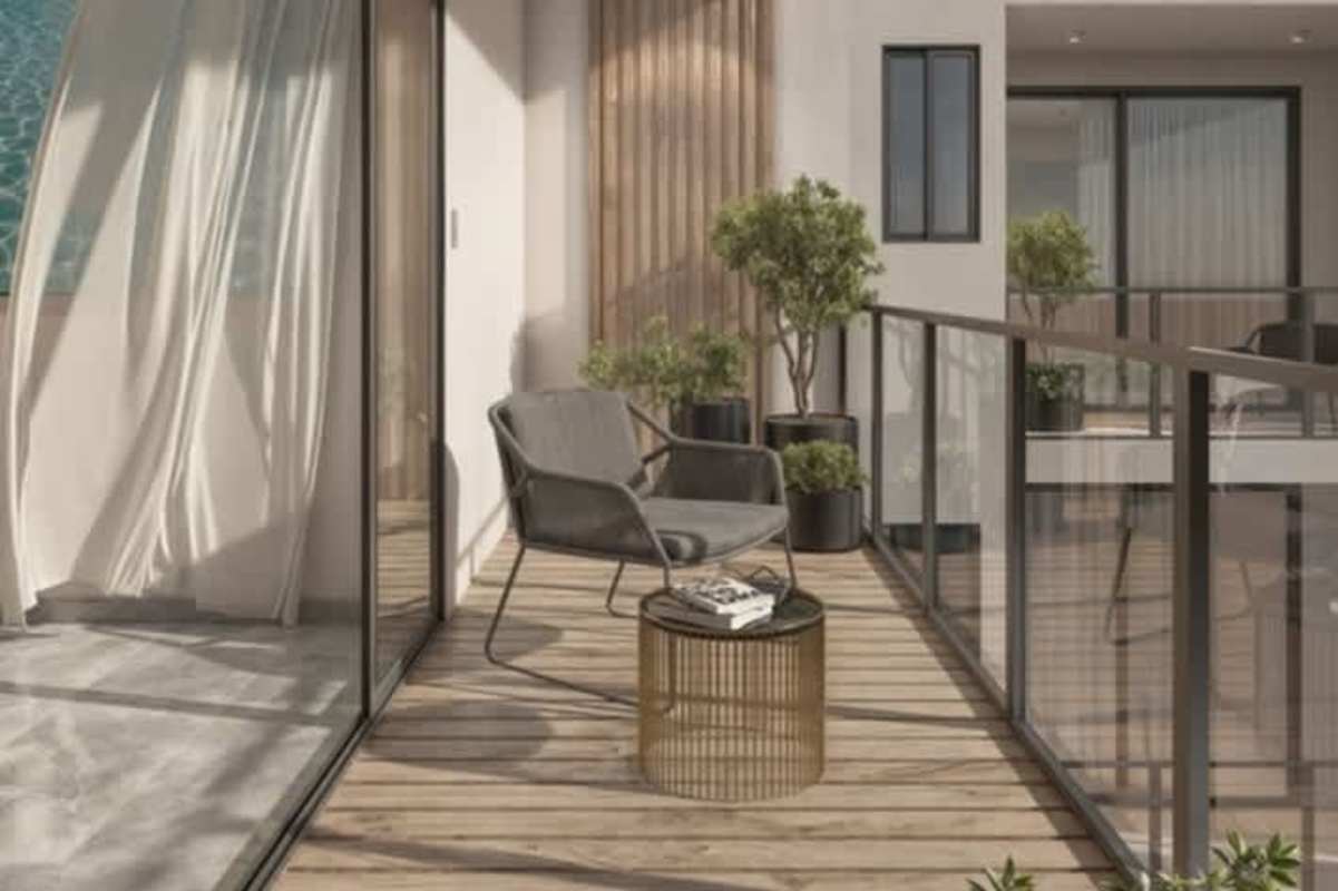 Private balcony with glass railing, wood decking, panoramic Panama City view in Bella Vista Edge