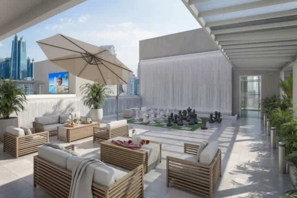 Designer swimming pool with sun loungers, waterfall feature, tropical landscape in Bella Vista Edge Panama