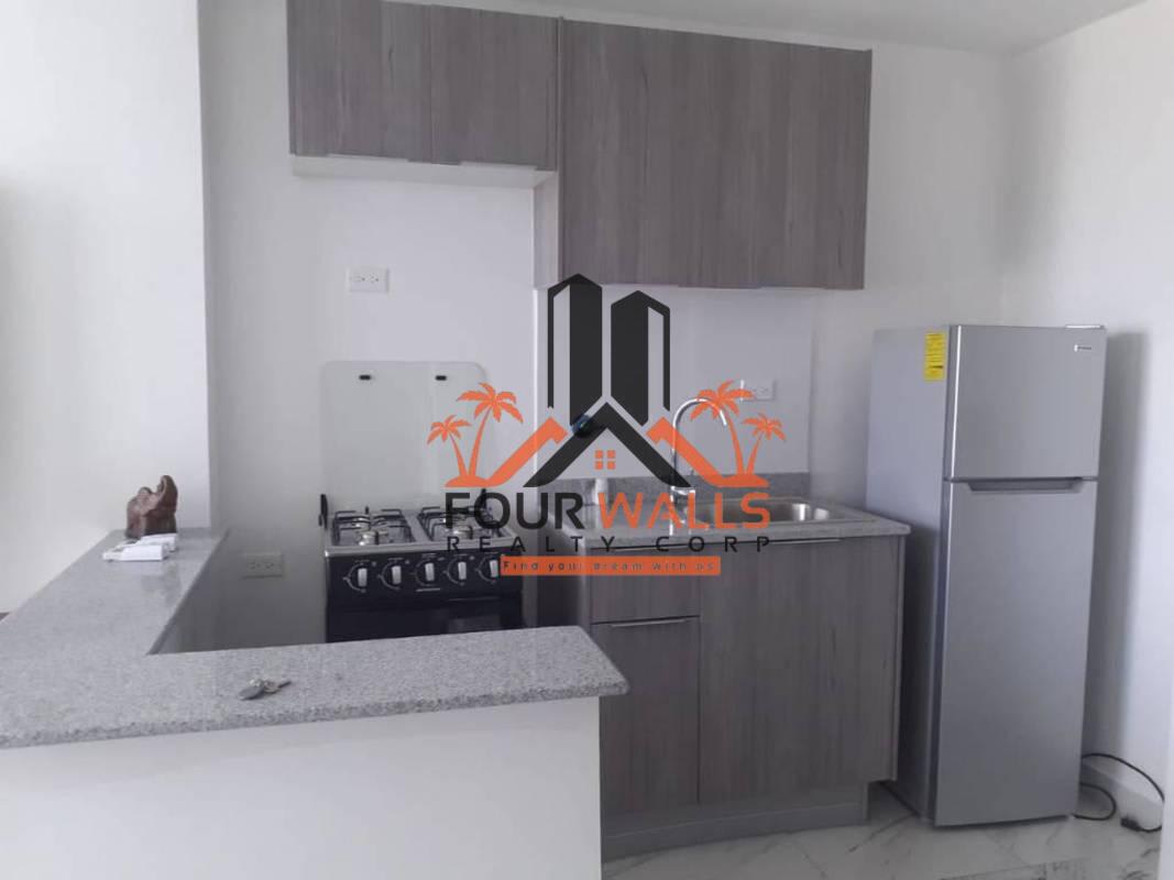 Living room with floor-to-ceiling windows, ocean view, attached balcony in PH The Sands Avenida Balboa Panama