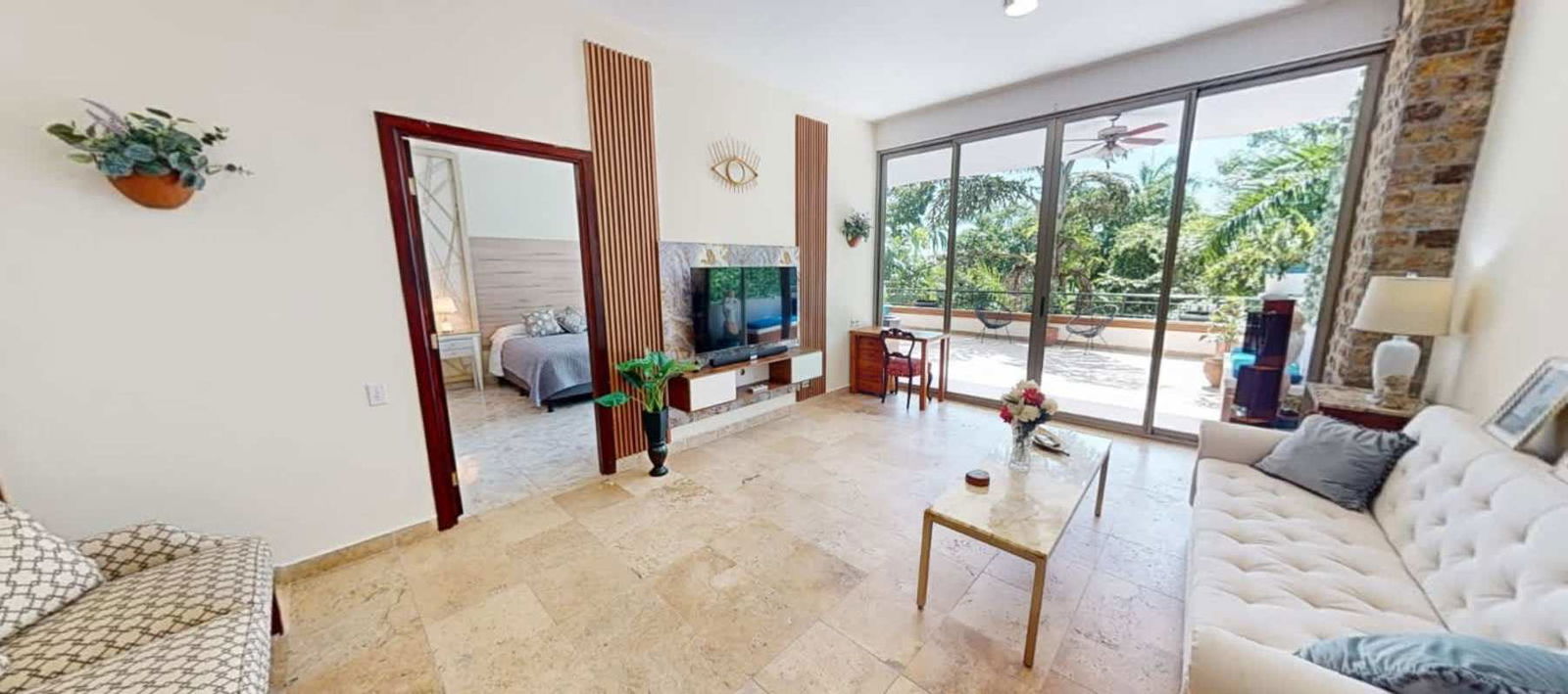 Fully equipped kitchen with marble backsplash and open dining area PH Amador Hills Panama