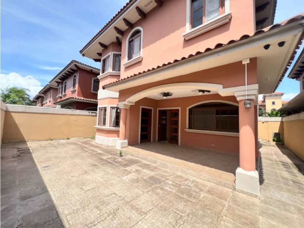 Natural light on upstairs hallway with iron railings and wood floors Costa Sur Panama