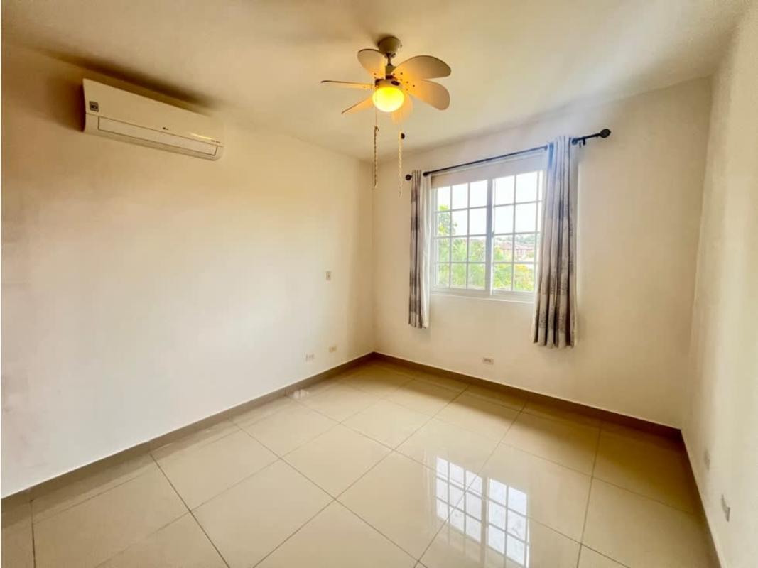 Contemporary bathroom with beige tiles, granite sink, bathtub in Villa Valencia Costa Sur Panama