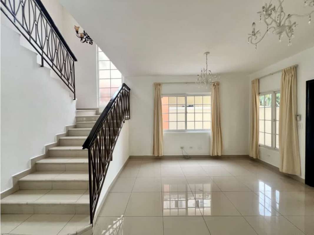 Contemporary kitchen with granite countertops, island, gas stove at Villa Valencia Costa Sur Panama