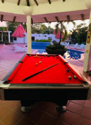 Outdoor pool table gazebo swimming pool garden at Panama beach villa