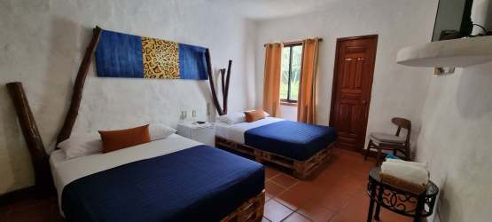 Double bedroom with rustic decor wooden furniture cozy Panama beach rental